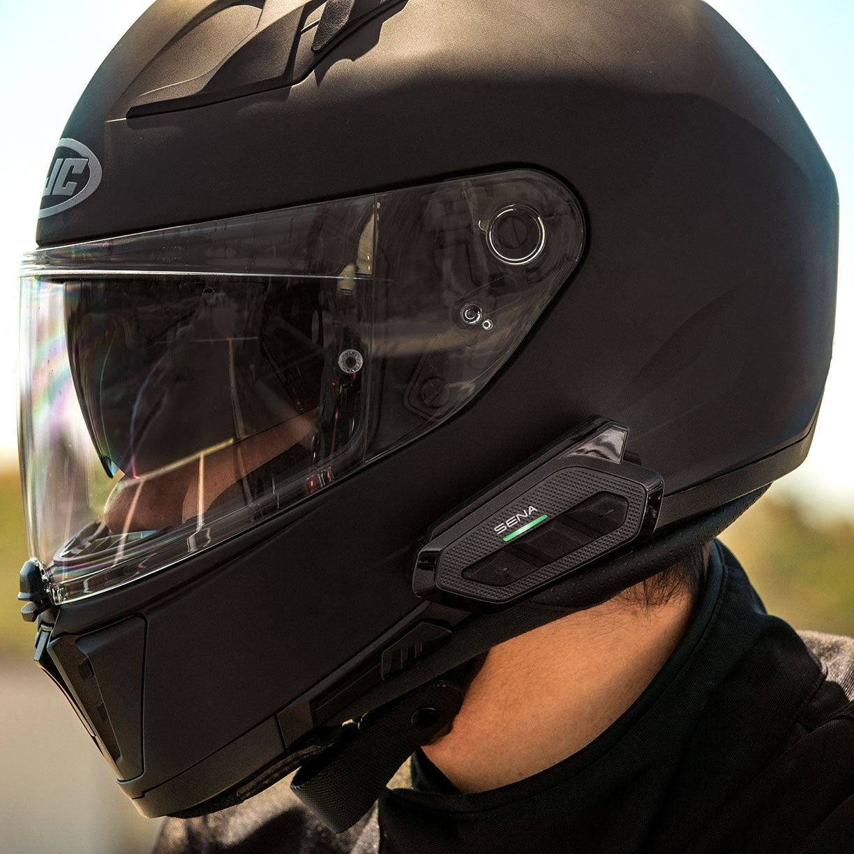 Sena Spider RT1 mounted on motorcycle helmet for rider communication