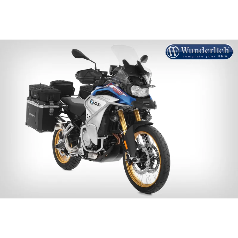 Motorcycle with luggage and Wunderlich logo on a white background