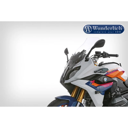 Motorcycle with Wunderlich logo on a white background